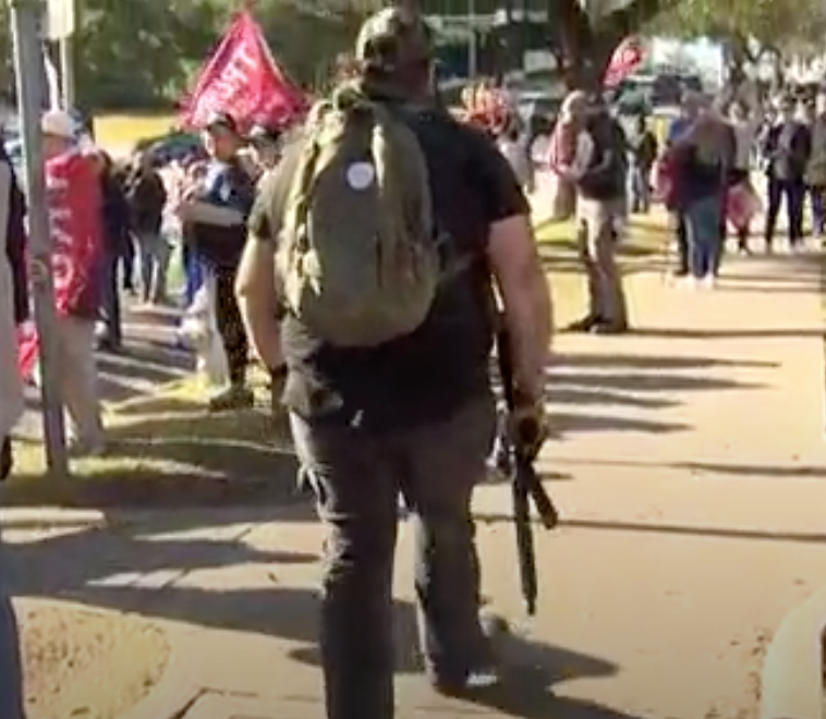 TXGR Man With AR At Protest